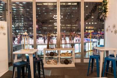 Cozy rinkside private space for VIP and small party rentals at Winter Village at Bryant Park in NYC.