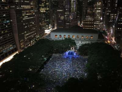 The Rangers take over the lawn in Bryant Park NYC with a huge screen showing their playoff games for thousands of fans sitting on the lawn.