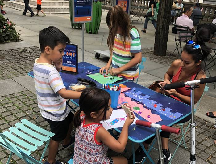 Kids make art and eat at the Art Cart