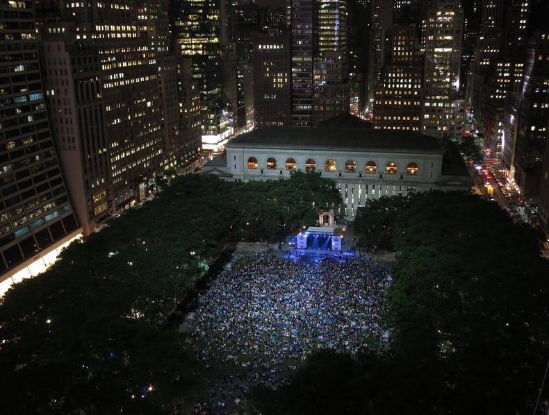 The Rangers take over the lawn in Bryant Park NYC with a huge screen showing their playoff games for thousands of fans sitting on the lawn.