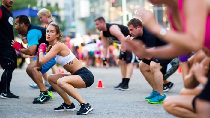 People exercise in Herald Square New York City.
