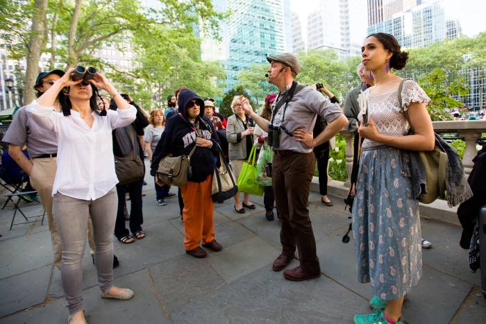Birding tour leader Gabriel Willow leads birders through Bryant Park NYC.