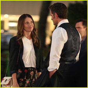 Sutton Foster stands in Bryant Park during a Younger TV shoot.